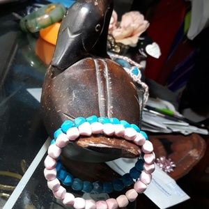 set of pink and blue Bracelets